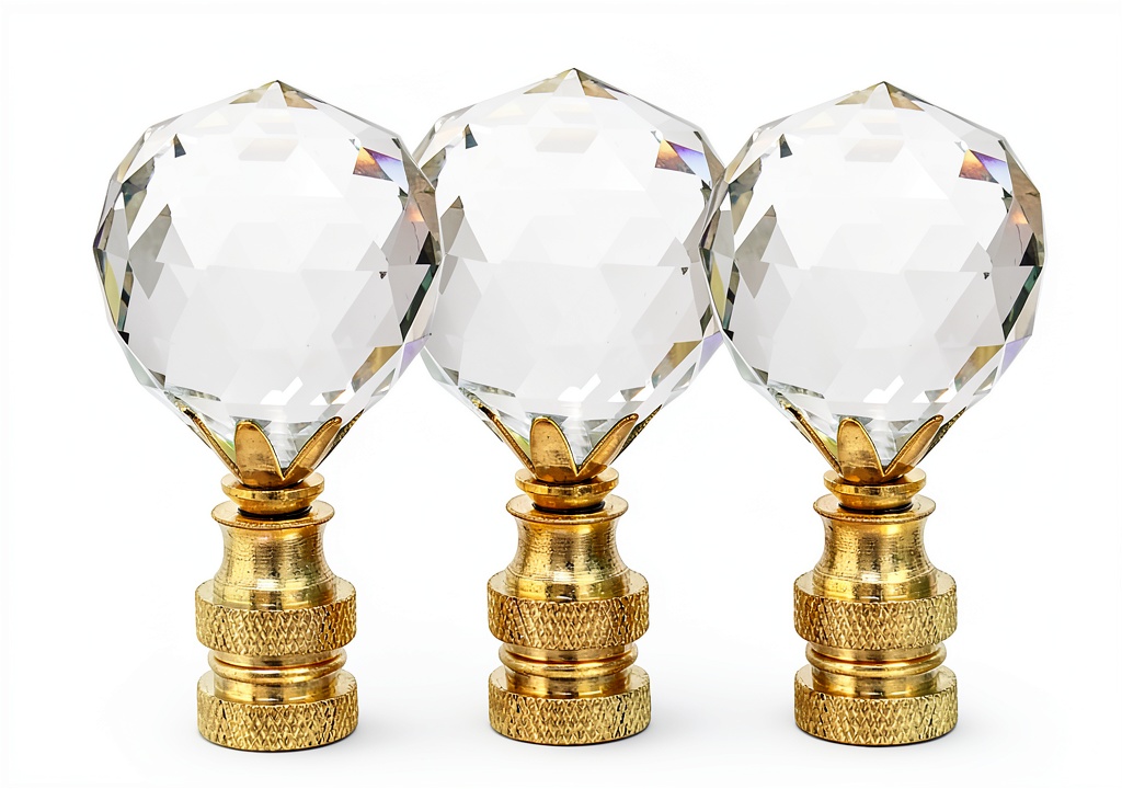Clear faceted crystal lamp finial with brass plated finish on a lamp